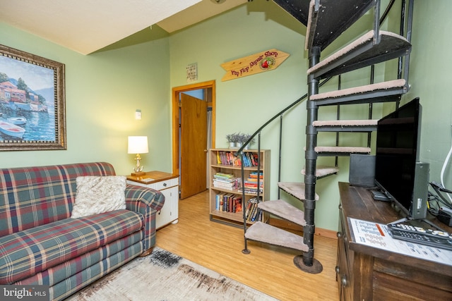 living room with light hardwood / wood-style floors