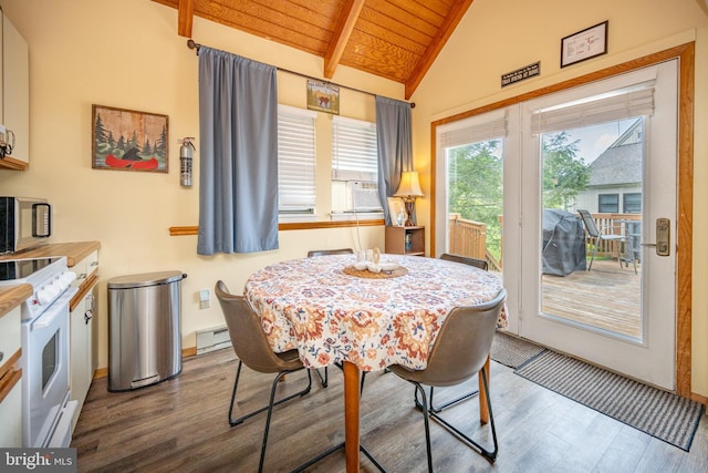 dining room with wood-type flooring, vaulted ceiling with beams, wooden ceiling, cooling unit, and a baseboard radiator