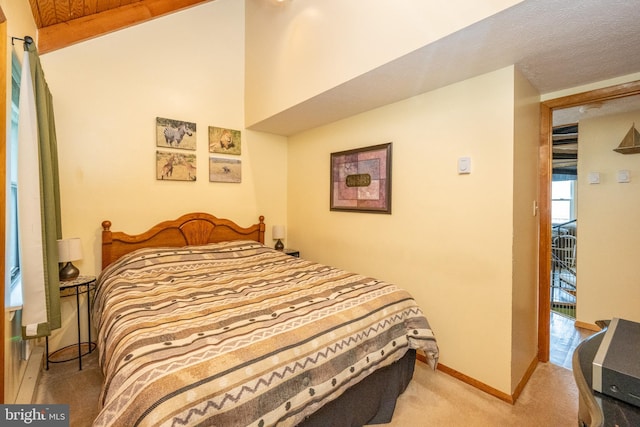 carpeted bedroom with a textured ceiling