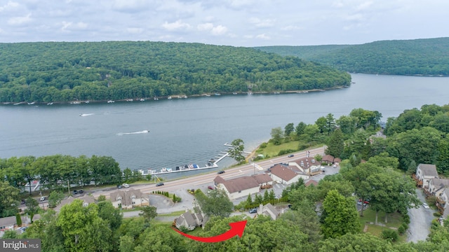 birds eye view of property featuring a water view