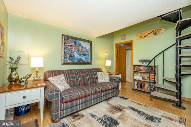 living room with light hardwood / wood-style flooring