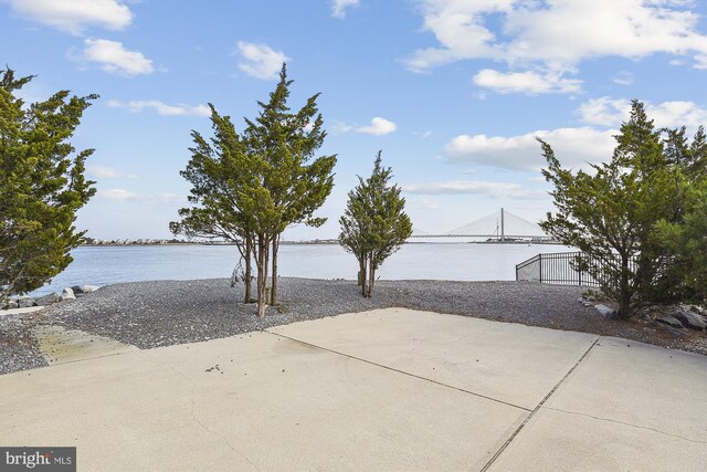 view of patio featuring a water view