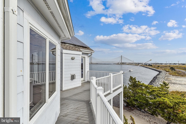 deck featuring a water view