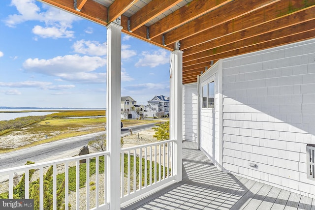 deck featuring a water view