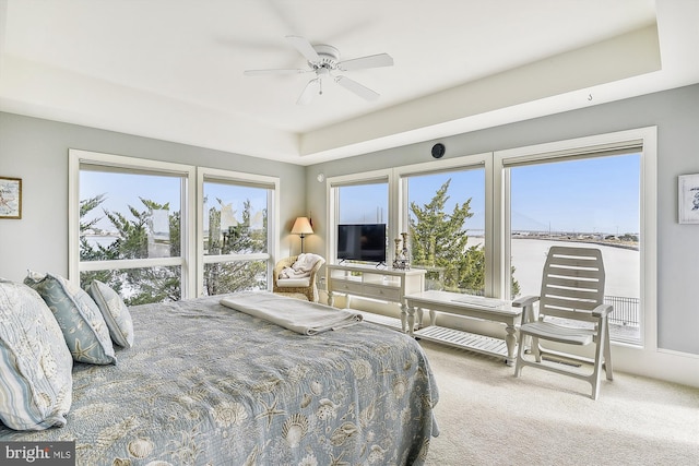 carpeted bedroom with a ceiling fan