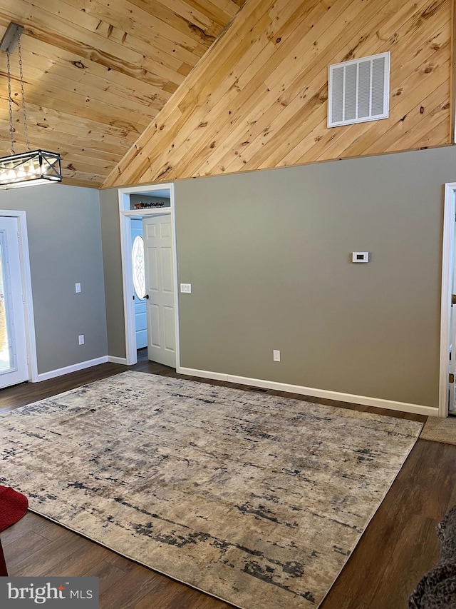 foyer entrance with wood-type flooring, wood ceiling, and high vaulted ceiling