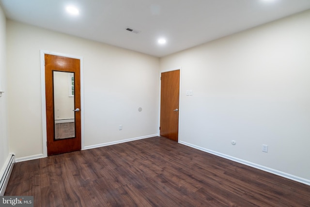 1363 Byberry Rd, Huntingdon Valley, PA 19006 - unfurnished room featuring dark wood-style flooring, baseboards, a baseboard heating unit, and visible vents