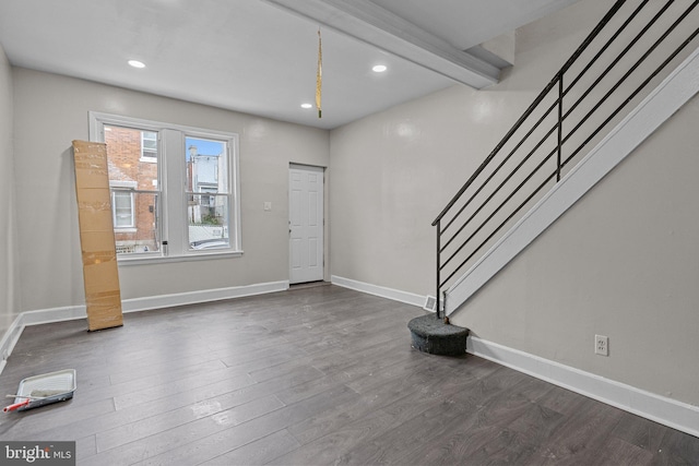 foyer with dark hardwood / wood-style floors