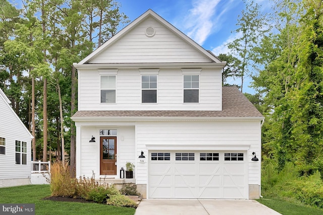 view of front of home with a garage