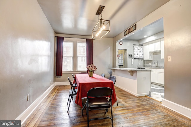 dining room featuring wood-type flooring