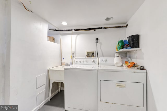 laundry area featuring washer and clothes dryer