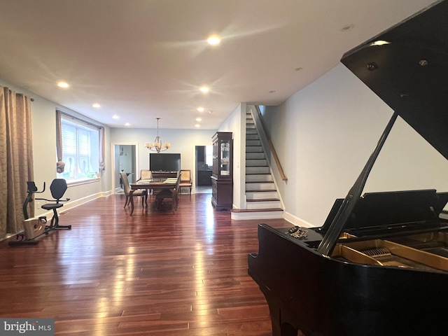 interior space featuring an inviting chandelier and hardwood / wood-style floors