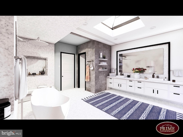 interior space with a skylight, double sink vanity, and a bathing tub