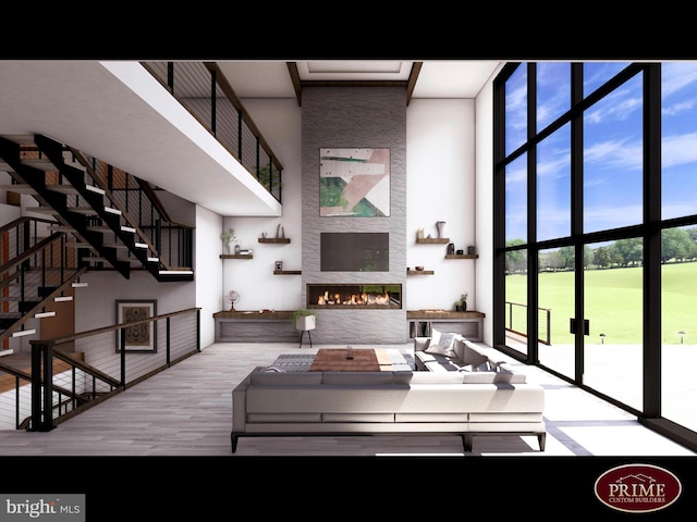 118 Hollow Horn Rd S Parcel, Unit South Parcel, Ottsville, PA 18942 - living room featuring a towering ceiling, a wall of windows, light hardwood / wood-style floors, and a large fireplace