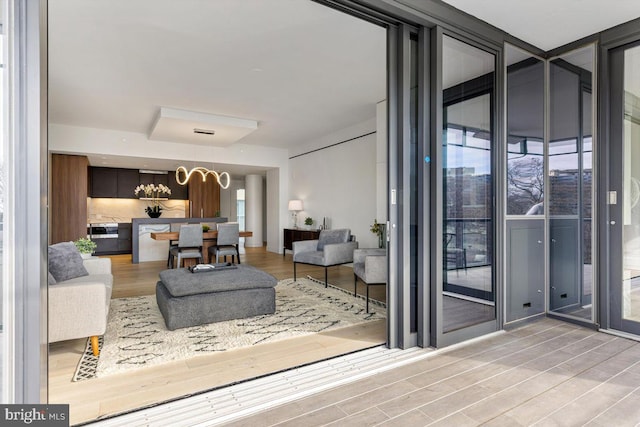 living room featuring hardwood / wood-style floors and floor to ceiling windows