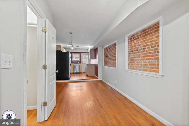 hall featuring light hardwood / wood-style flooring