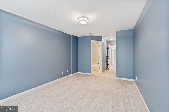 empty room with carpet flooring