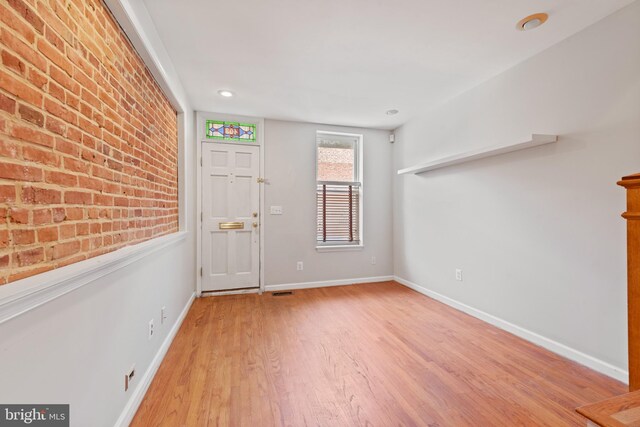 laundry room featuring stacked washer / dryer