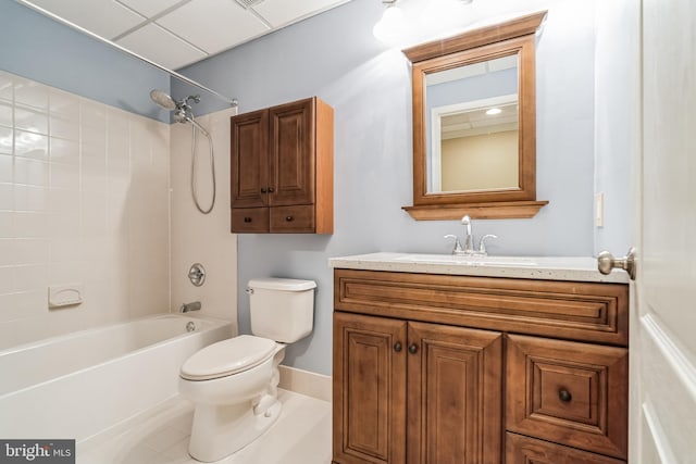 full bathroom featuring vanity, tile patterned floors, washtub / shower combination, and toilet