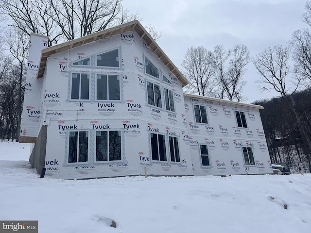 view of snow covered property