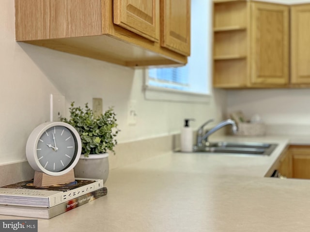 kitchen with sink and light brown cabinets