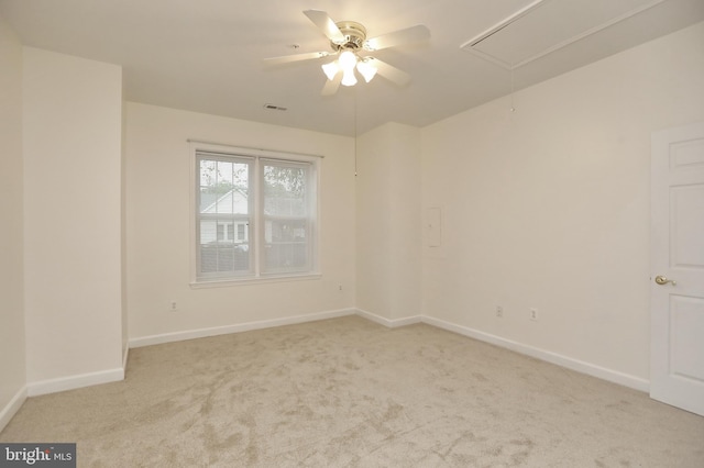 carpeted empty room with ceiling fan