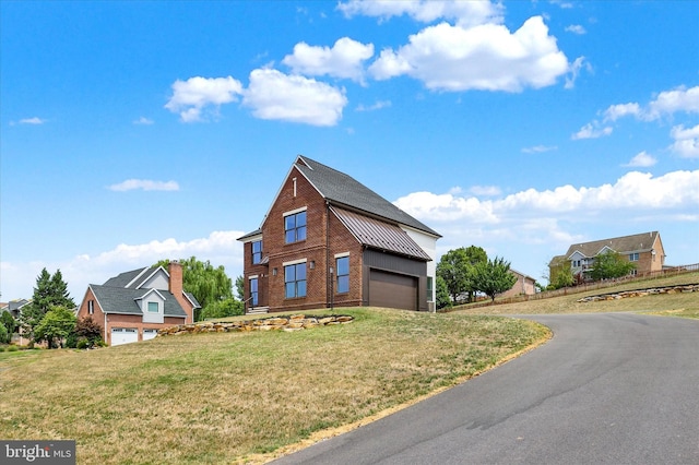 view of front of home featuring a front lawn