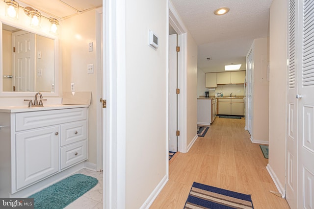 bathroom featuring vanity, curtained shower, and toilet