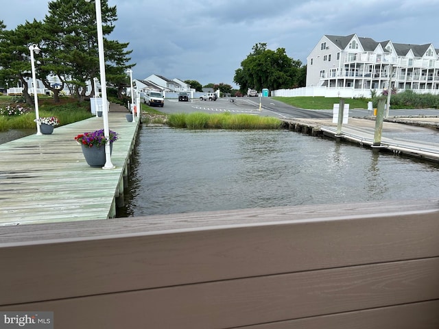 view of dock with a water view