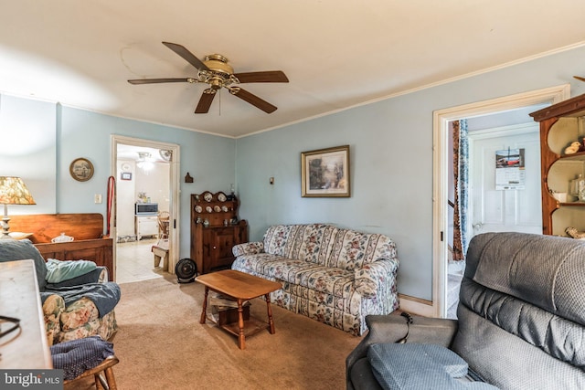 1757 Shadyside Rd, Downingtown, PA 19335 - living room with crown molding, carpet flooring, and a ceiling fan