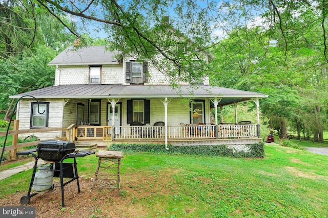 1757 Shadyside Rd, Downingtown, PA 19335 - country-style home featuring a chimney, a front lawn, and a porch