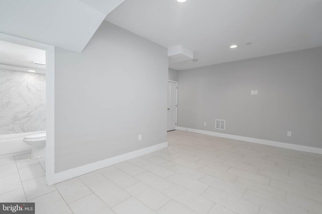 empty room featuring light tile patterned flooring