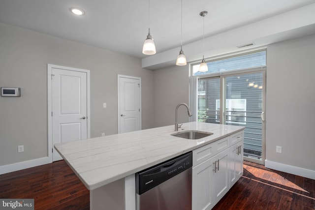 kitchen featuring dishwasher, sink, a center island with sink, and dark wood-type flooring