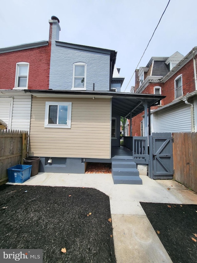 rear view of house with a patio