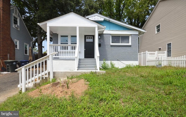 bungalow-style house featuring covered porch