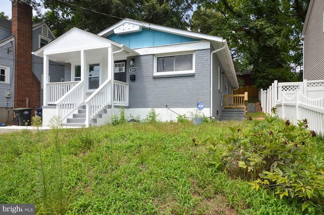 bungalow-style house with covered porch