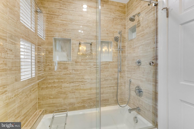 bathroom featuring enclosed tub / shower combo