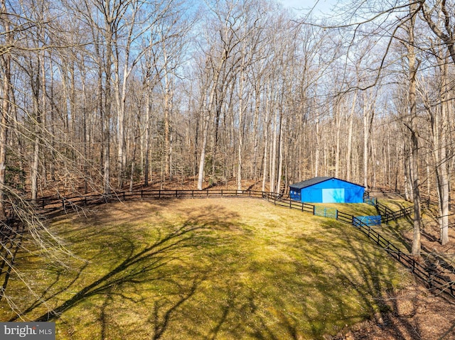 view of yard with an outdoor structure