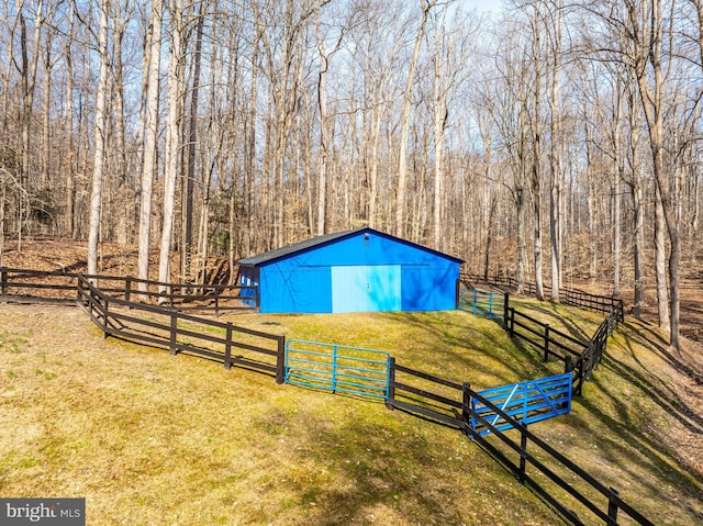 view of outdoor structure with a yard