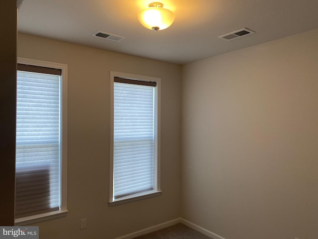 unfurnished room with a wealth of natural light