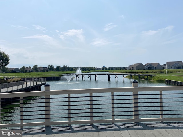 view of dock with a water view