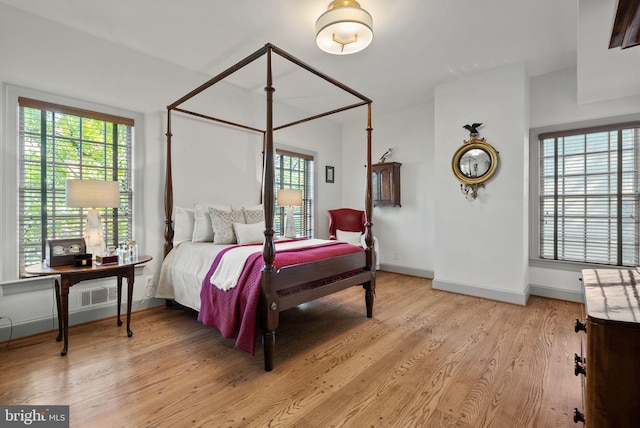 bedroom featuring light hardwood / wood-style floors