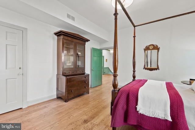 bedroom featuring light wood-type flooring