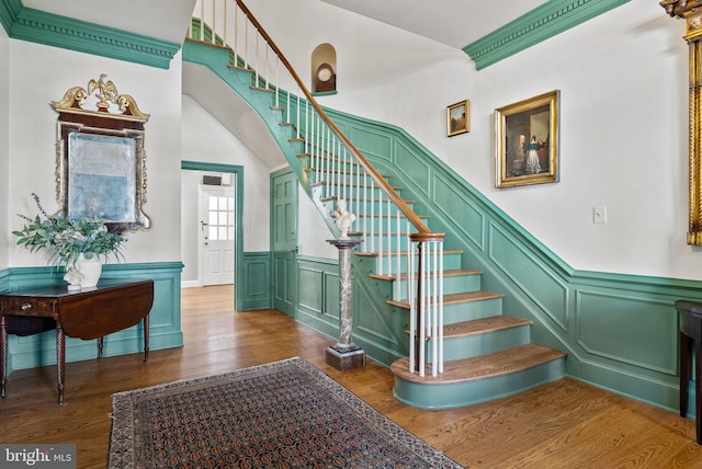 staircase featuring hardwood / wood-style flooring