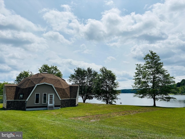 view of yard with a water view