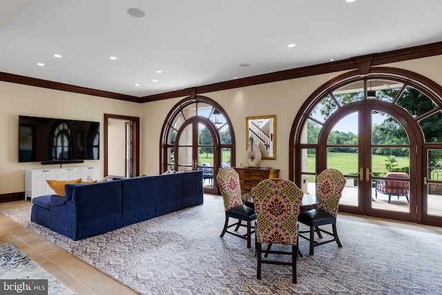 tiled dining area featuring french doors and ornamental molding