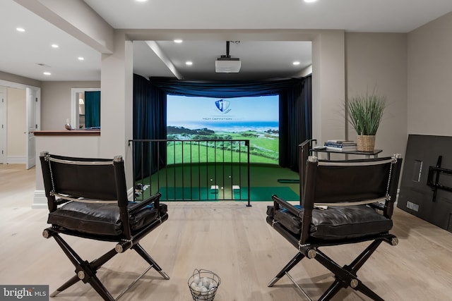 interior space featuring hardwood / wood-style flooring and golf simulator