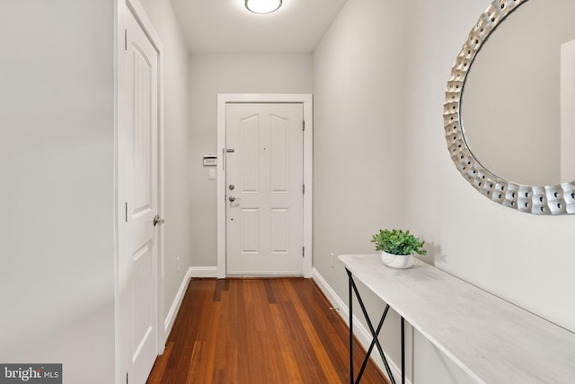 doorway to outside featuring dark hardwood / wood-style flooring