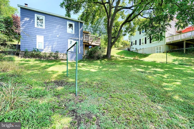 view of yard with a deck