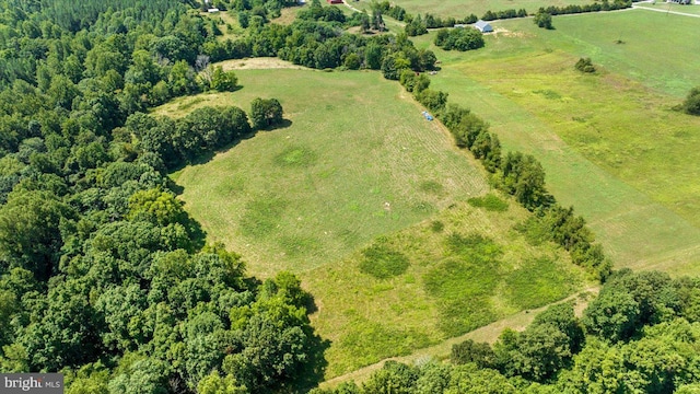 birds eye view of property featuring a rural view